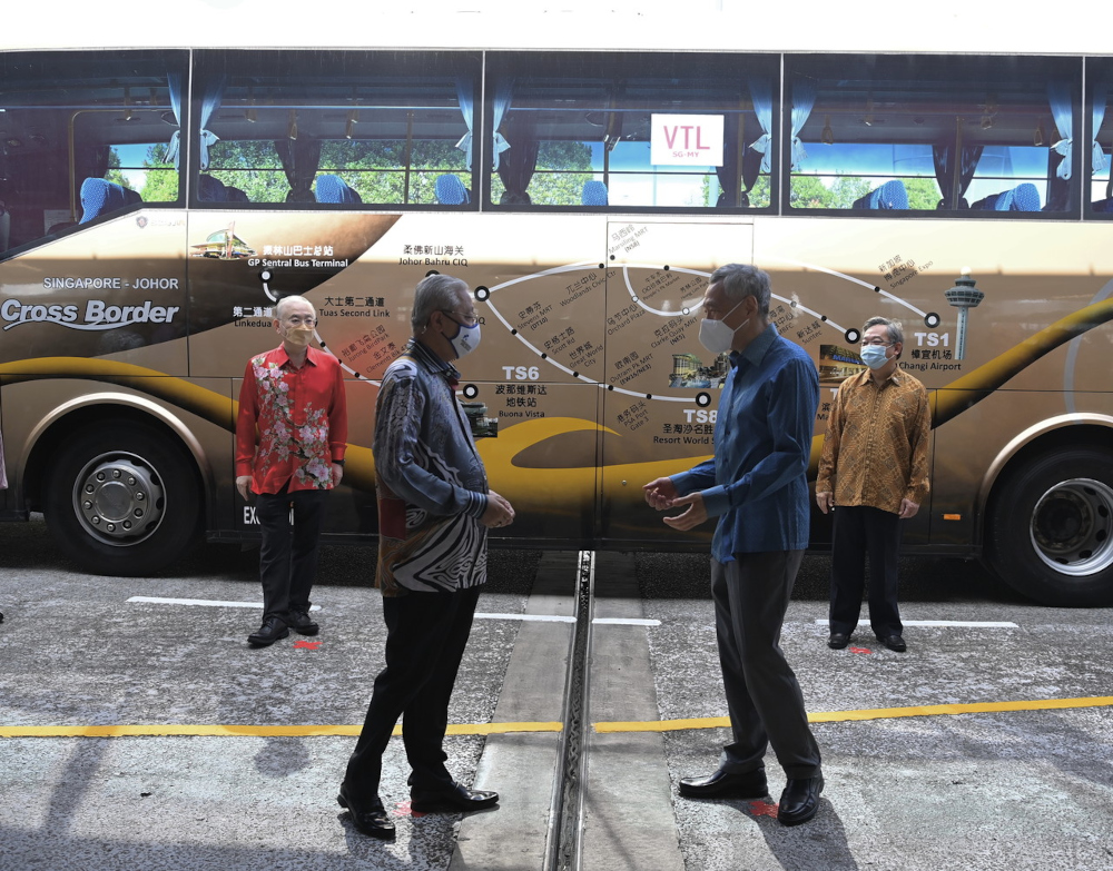 Prime Minister Datuk Seri Ismail Sabri Yaakob and his Singapore counterpart Lee Hsien Loong at the launch of the land Vaccinated Travel Lane at Woodlands Checkpoint, November 29, 2021. u00e2u20acu201d Bernama pic  