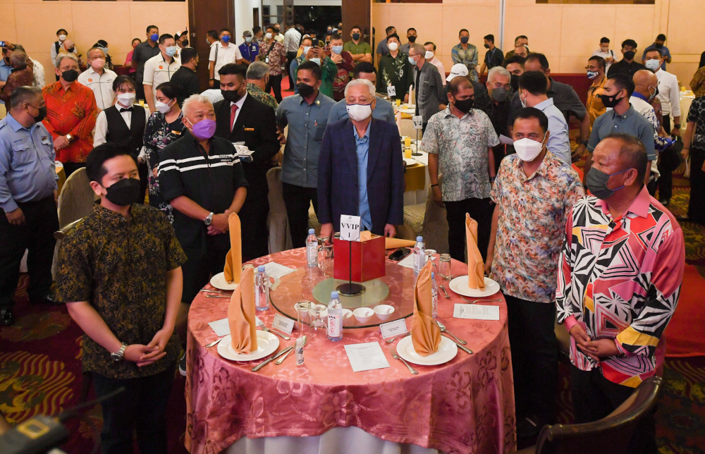 Prime Minister Datuk Seri Ismail Sabri Yaakob with Sabah Deputy Chief Minister Datuk Seri Bung Moktar Radin attend the Sandakan district community leaders meeting with the prime minister in Sandakan, November 5, 2021. u00e2u20acu201d Bernama picnn