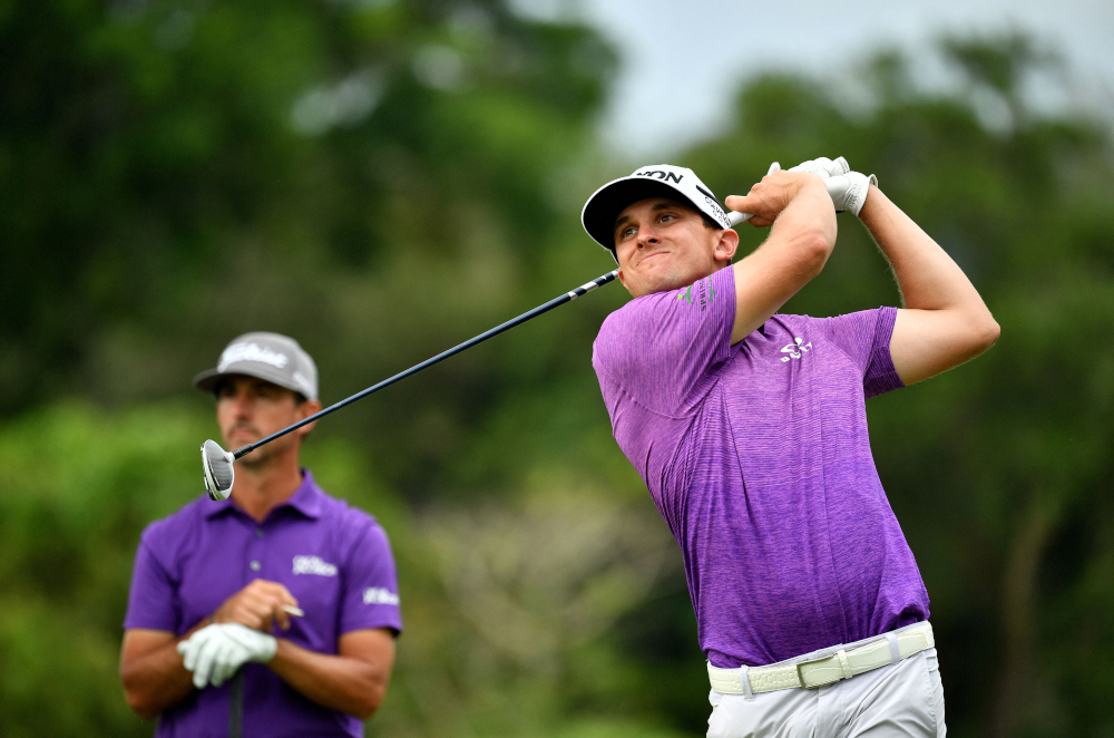John Catlin of the US playing a shot during round one of the Blue Canyon Championship golf tournament at the Blue Canyon Country Club in Phuket, November 25, 2021. u00e2u20acu201d Paul Lakatos/Asian Tour handout pic via AFPnn