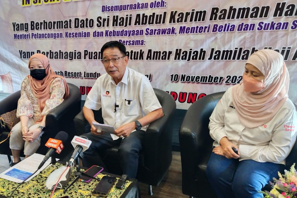 Datuk Seri Abdul Karim Rahman Hamzah speaks at the press conference, flanked by Nancy Jolhi (left) and Datuk Amar Jamilah Anu. u00e2u20acu201d Borneo Post pic
