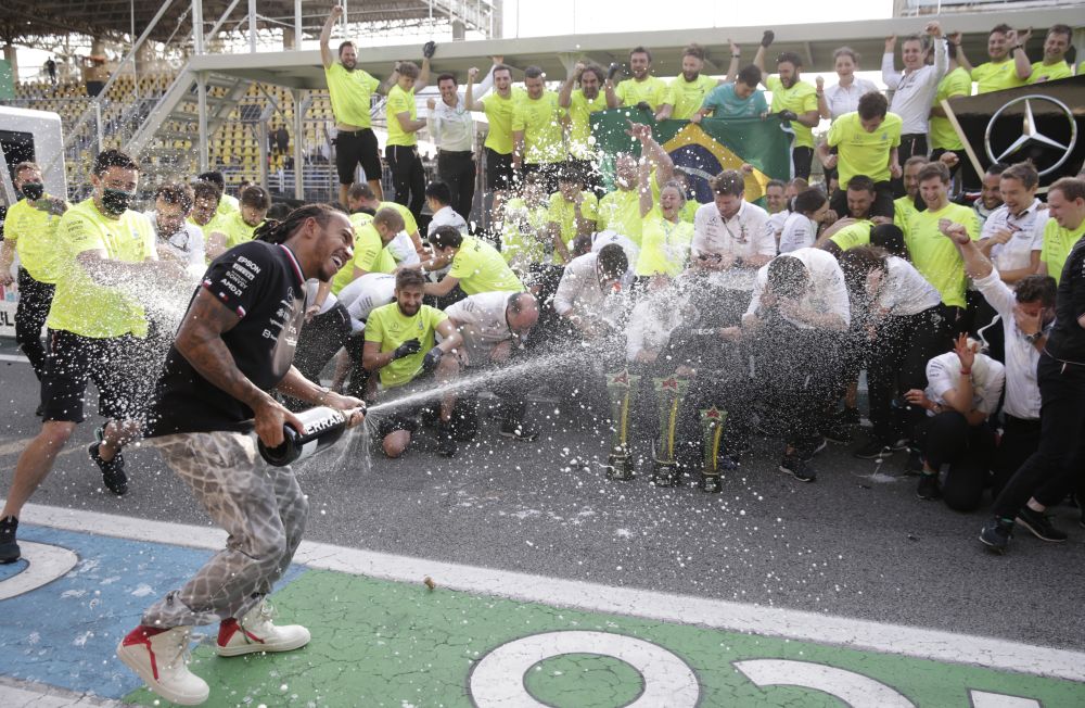 Mercedes' Lewis Hamilton sprays his team with champagne as he celebrates winning the Brazilian Grand Prix at the Jose Carlos Pace Circuit, Sao Paulo November 14, 2021. u00e2u20acu201d Reuters pic