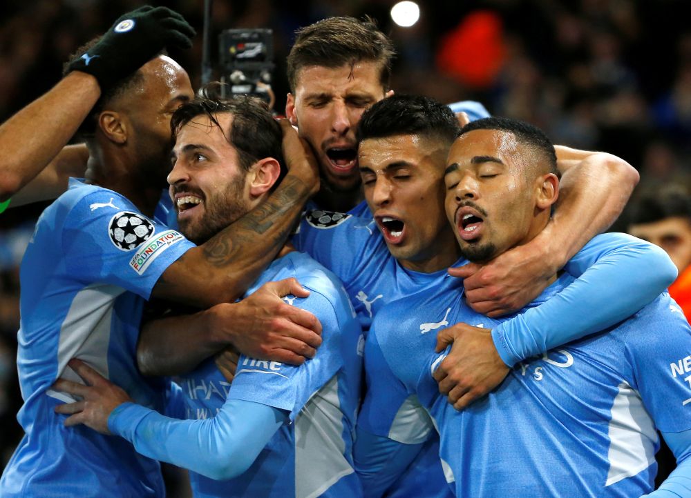 Manchester City's Gabriel Jesus (right) celebrates scoring their second goal against PSG with teammates at the Etihad Stadium, Manchester November 24, 2021. u00e2u20acu201d Reuters pic
