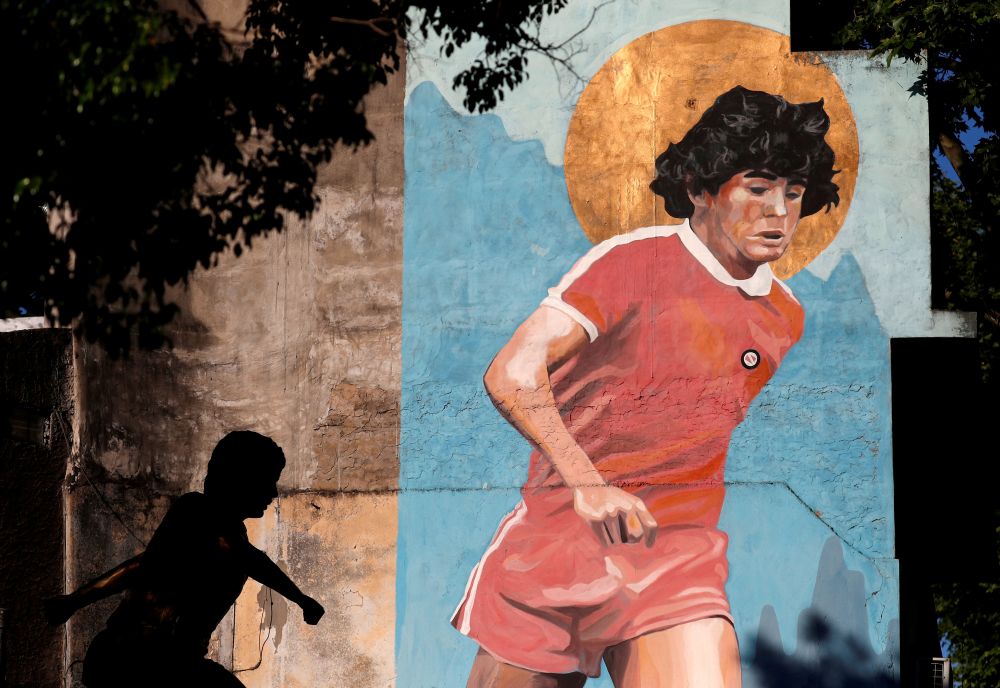 A mural depicting late football legend Diego Maradona is pictured outside the Diego Maradona stadium, before a celebration marking his 61st birth date, in Buenos Aires October 30, 2021. u00e2u20acu201d Reuters pic