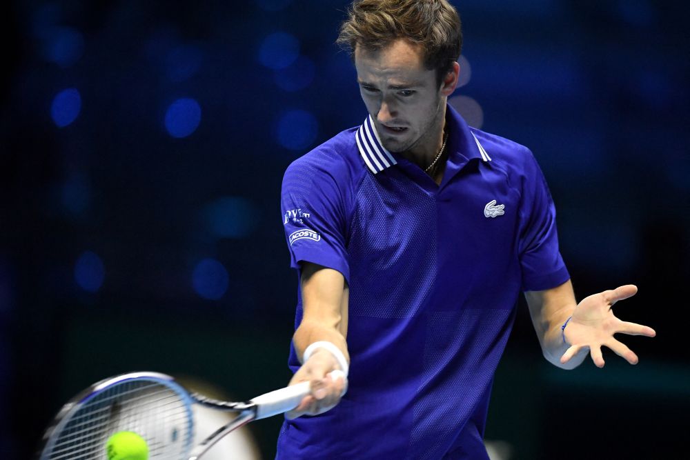 Russiau00e2u20acu2122s Daniil Medvedev returns the ball to Polandu00e2u20acu2122s Hubert Hurkacz during their first round singles tennis match of the ATP Finals at the Pala Alpitour venue in Turin November 14, 2021. u00e2u20acu201d AFP pic