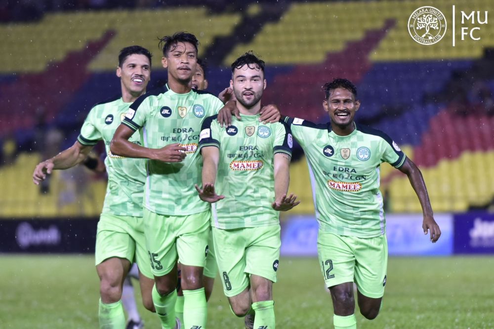 Melaka United players celebrate a goal against Kedah Darul Aman FC at the Hang Jebat Stadium last night. u00e2u20acu201d Picture via Facebook