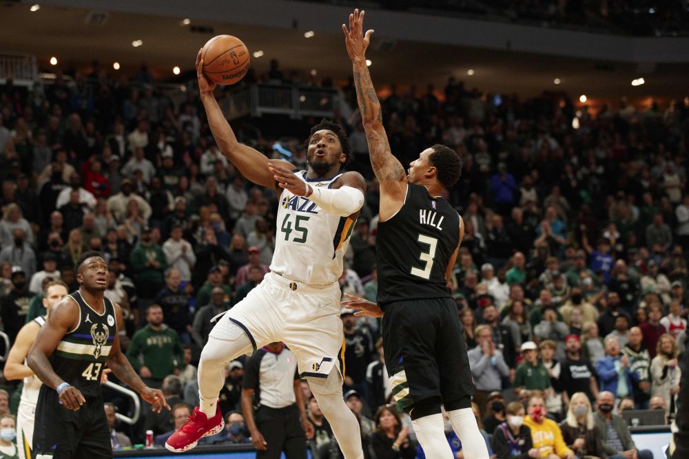 Utah Jazz guard Donovan Mitchell (45) shoots against Milwaukee Bucks guard George Hill (3) during the fourth quarter at Fiserv Forum, Milwaukee October 31, 2021. u00e2u20acu201d Reuters pic