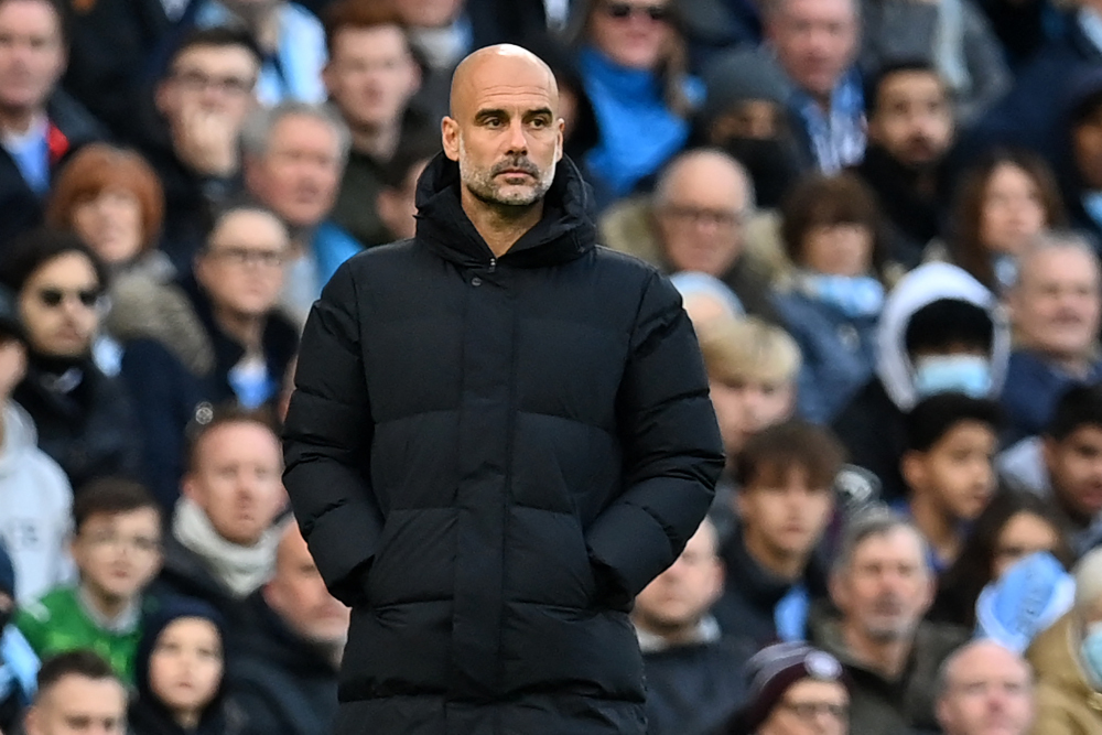 Manchester City manager Pep Guardiola looks on from the touchline during the English Premier League match with Everton at the Etihad Stadium in Manchester, November 21, 2021. u00e2u20acu201d AFP picnn