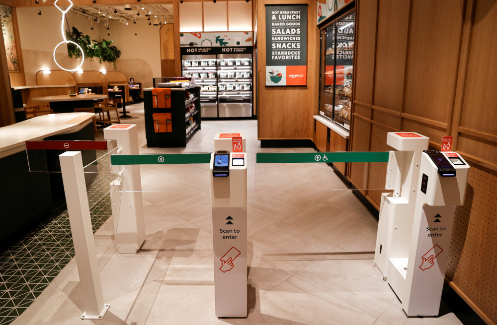 The entrance turnstiles of a new Starbucks store, its first-ever in partnership with Amazon Go that lets customers check out without a cashier, is pictured during a preview of the store on November 16, 2021.  u00e2u20acu201d Reuters pic