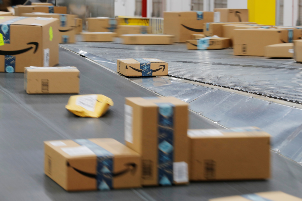 Amazon packages are transported by conveyor belts inside of an Amazon fulfilment centre on Cyber Monday in Robbinsville, New Jersey December 2, 2019. u00e2u20acu201d Reuters pic