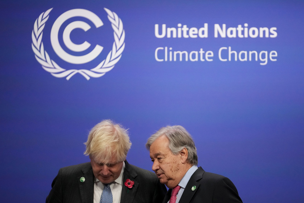 Britainu00e2u20acu2122s Prime Minister Boris Johnson and United Nations sec-gen Antonio Guterres prepare to receive attendees during arrivals at the UN Climate Change Conference (COP26) in Glasgow November 1, 2021. u00e2u20acu201d Christopher Furlong/Pool pic via Reuters 