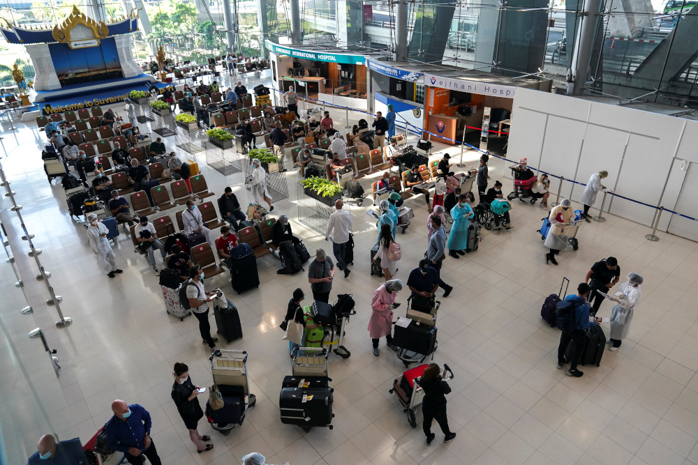 Foreign tourists arrive at Suvarnabhumi Airport during the first day of the countryu00e2u20acu2122s reopening campaign, part of the governmentu00e2u20acu2122s plan to jump-start the pandemic-hit tourism sector in Bangkok November 1, 2021. u00e2u20acu201d Reuters pic