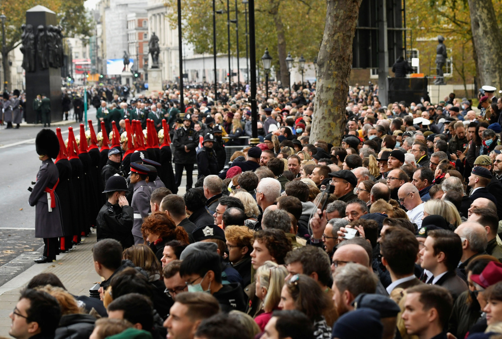 People attend the annual National Service of Remembrance in Whitehall, London November 14, 2021. — Reuters pic