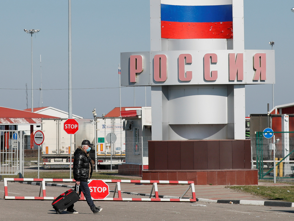A man walks at a crossing point on the border with Russia in Hoptivka near Kharkiv, Ukraine March 18, 2020. u00e2u20acu201d Reuters pic