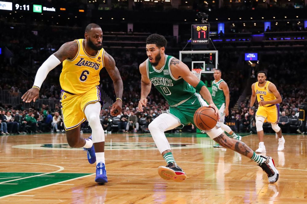 Boston Celtics forward Jayson Tatum (0) drives to the basket defended by Los Angeles Lakers forward LeBron James (6) during the second half at TD Garden in Massachusetts November 19, 2021. u00e2u20acu2022 Reuters pic