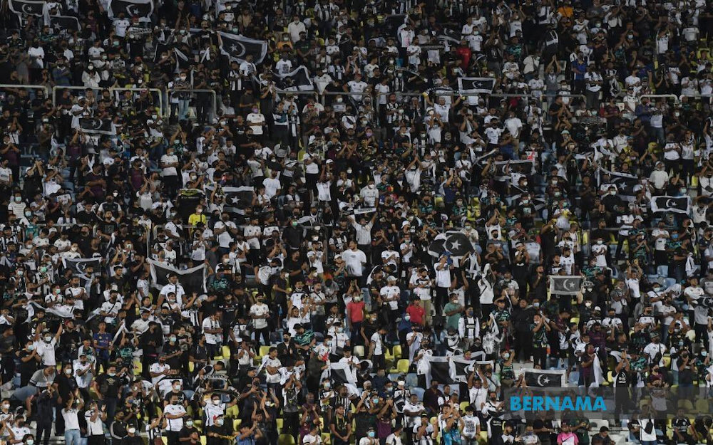Terengganu FC fans are seen during a match. u00e2u20acu201d Picture via Twitter/Bernama