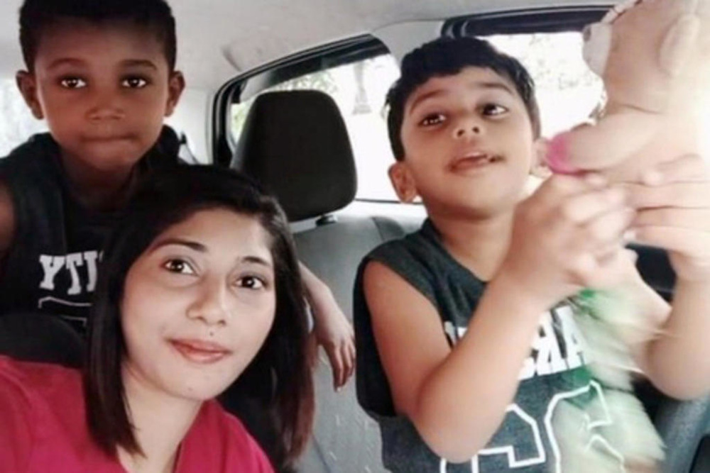 Nafisah Alahu, a Malaysian still stuck in Singapore, pictured in pre-pandemic times with her two sons, now aged five and eight, whom she has not seen in close to two years. u00e2u20acu201d Photo courtesy Nafisah Alahu