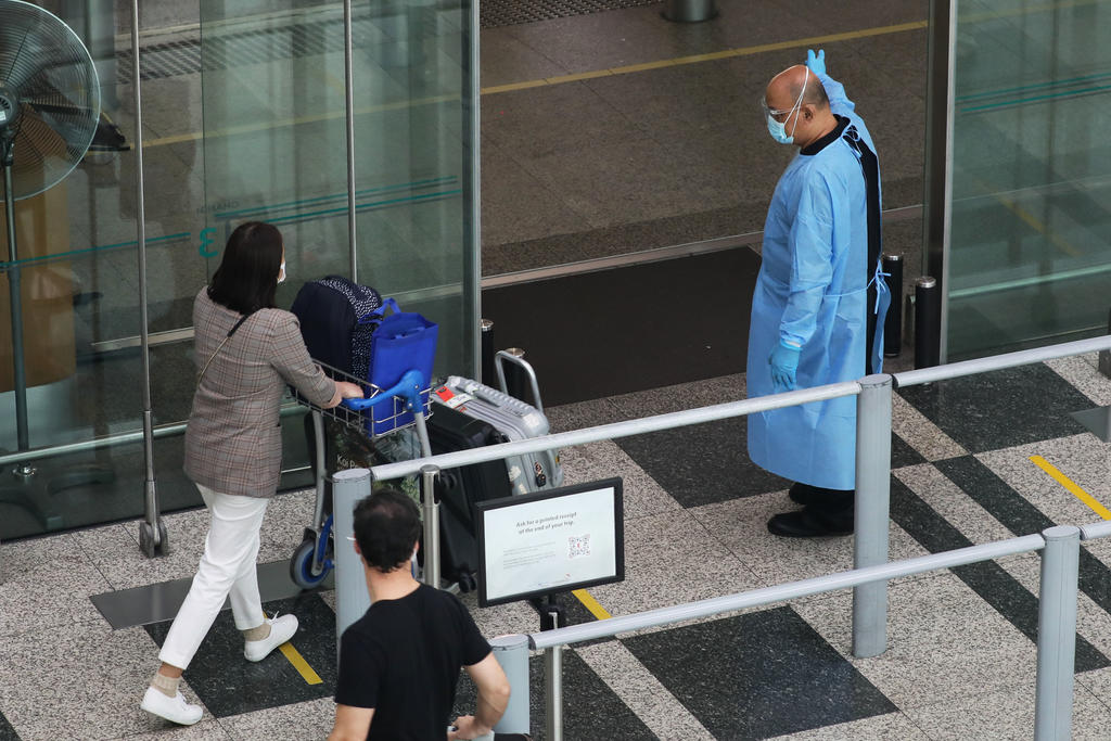 Earlier in November, the authorities announced that Singapore and Malaysia will launch a vaccinated travel lane between Changi Airport and Kuala Lumpur International Airport from November 29. u00e2u20acu2022 TODAY pic