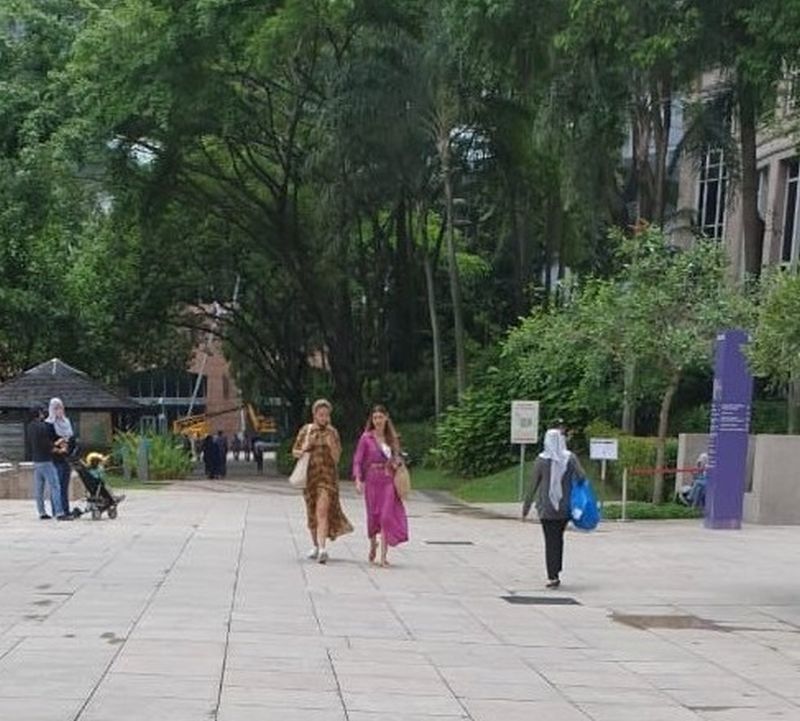 The two women aged 39 and 37 have been called in for questioning in relation to a picture of them walking around outside the popular city shopping centre without masks, which went viral on November 17. u00e2u20acu201d Picture via Twitter