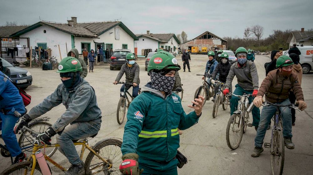 Vietnamese workers near the construction site of a Linglong factory in Zrenjanin, Serbia, on November 19, 2021. u00e2u20acu201d AFP pic