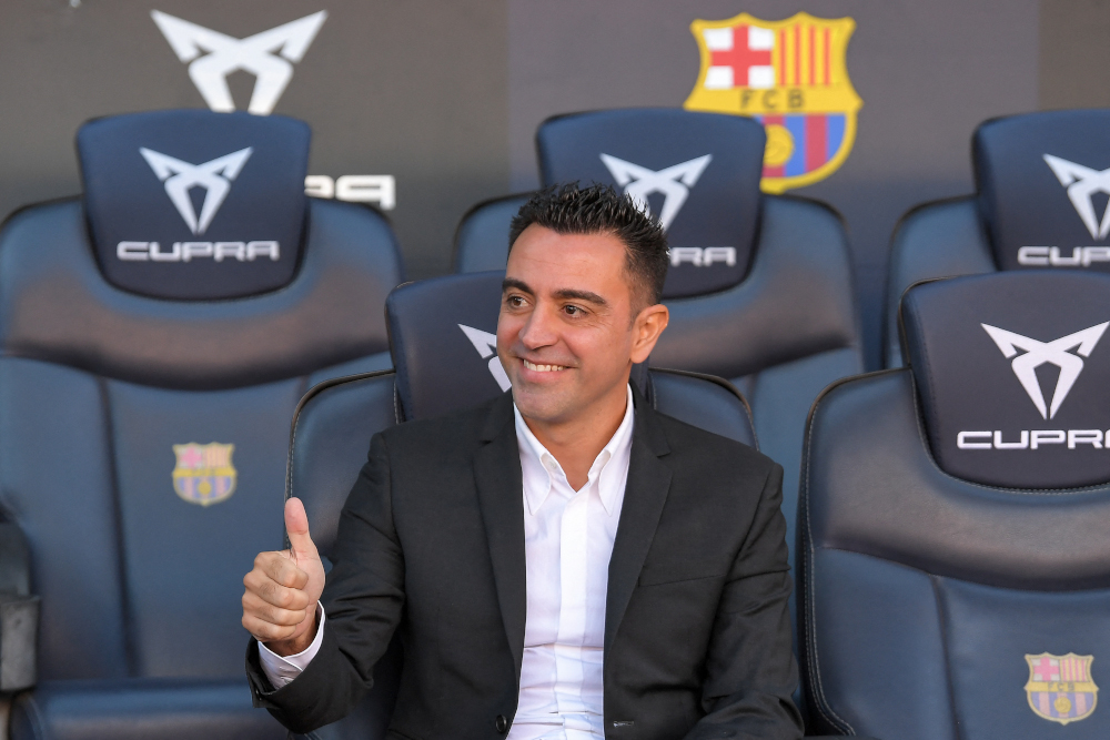 Newly-appointed FC Barcelonau00e2u20acu2122s Spanish coach Xavi Hernandez poses for pictures during his presentation ceremony at the Camp Nou stadium in Barcelona, November 8, 2021. u00e2u20acu201d AFP pic 