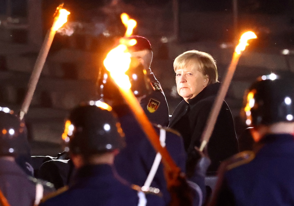 Germanyu00e2u20acu2122s outgoing Chancellor Angela Merkel attends a Grand Tattoo of the German armed forces Bundeswehr at the Defence Ministry in Berlin, Germany December 2, 2021. u00e2u20acu201d Reuters pic