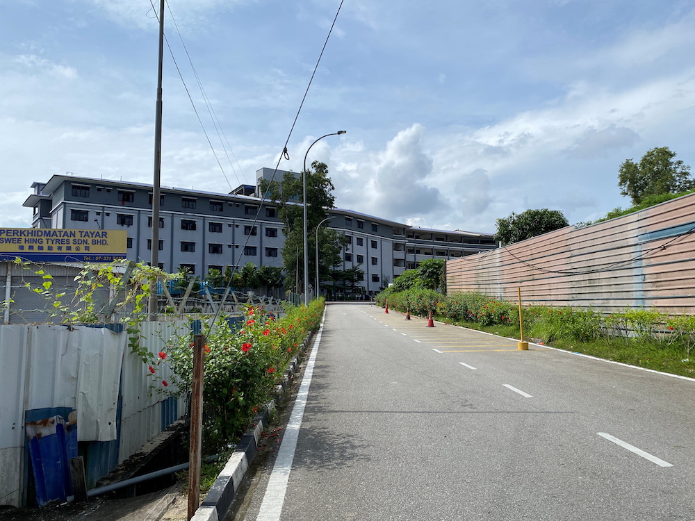 A five-storey workers' hostel owned by ATA IMS Bhd is seen in Johor Baru November 28, 2021. — Reuters pic 