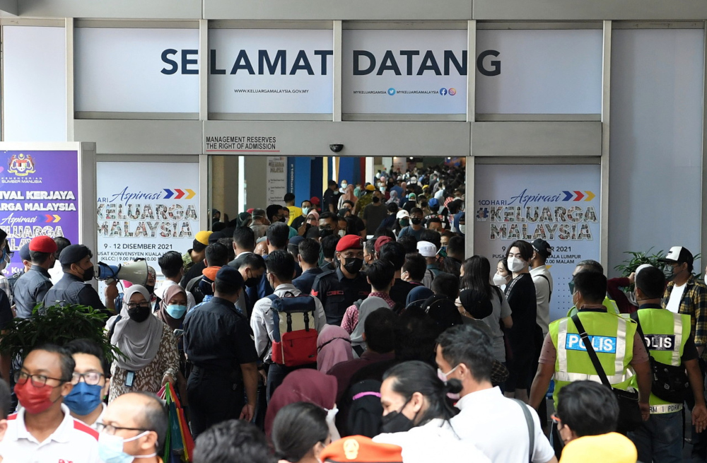 The 'Aspirasi Keluarga Malaysia' event saw scant physical distancing, earned brickbats from the public after pictures went viral on social media. — Bernama pic 