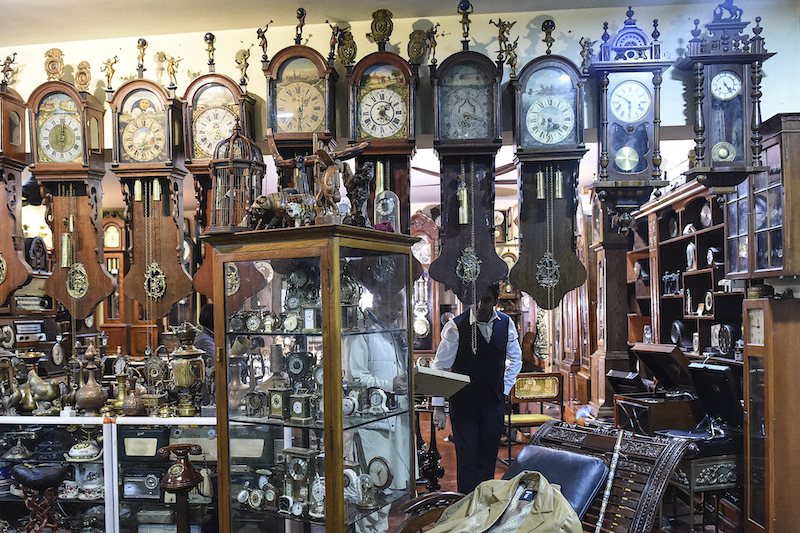 Collector Gul Kakar walks around his antique clocks at a museum housed inside the city's tribal police headquarters compound in Quetta. u00e2u20acu201d AFP pic