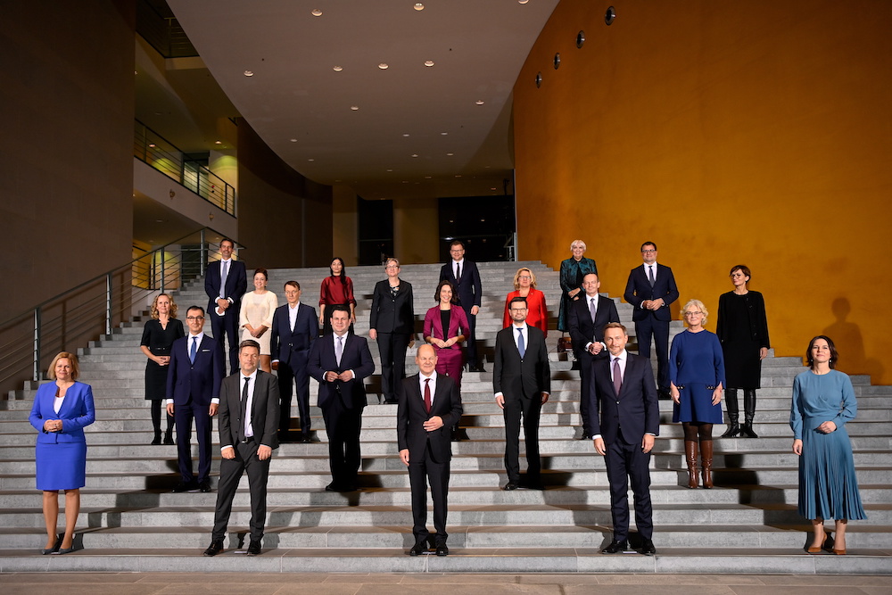 Newly elected German Chancellor Olaf Scholz and his ministers pose for a group photo at the first meeting of the new cabinet at the Chancellery in Berlin, Germany December 8, 2021. u00e2u20acu201d Ina Fassbender/Pool via Reuters