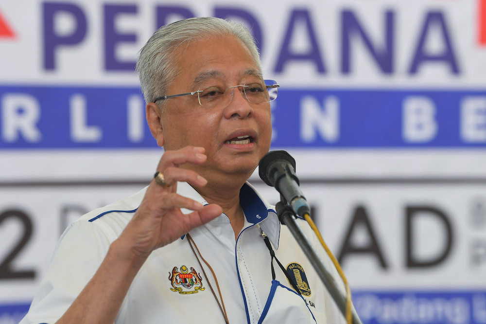 Prime Minister Datuk Seri Ismail Sabri Yaakob delivers his speech at a circumcision programme at Dewan Majlis Daerah Bera, Padang Luas December 12, 2021. u00e2u20acu201d Bernama pic