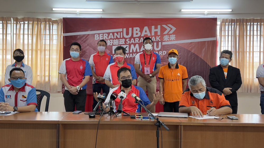 Chong speaks at the press conference as candidates from PH component parties look on. u00e2u20acu201d Picture by Roystein Emmor via Borneo Post