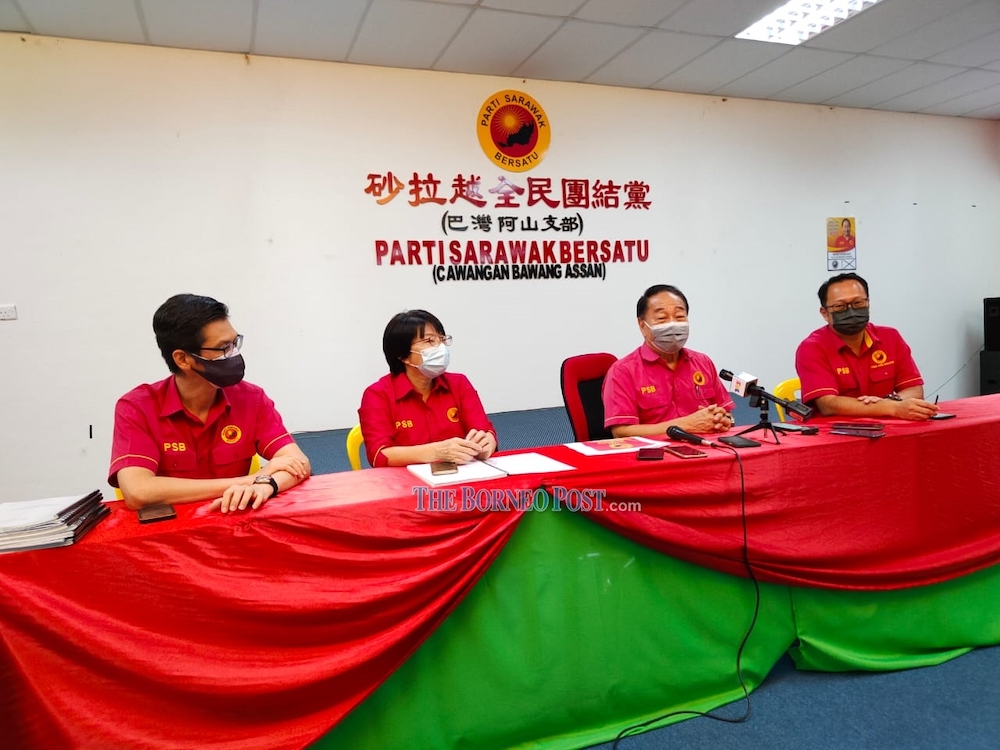 Wong (2nd right) fields questions from the media, while (from left) PSB candidates Dr Low Chong Nguan (Pelawan), Wong Hie Ping, (Dudong), and Andrew Ting (Bukit Assek) look on. u00e2u20acu201d Picture by Peter Boon via Borneo Post