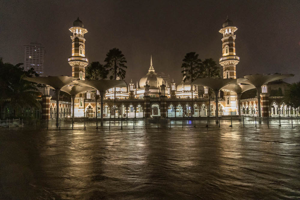 Floodwaters at Masjid Jamek Mosque in Kuala Lumpur amid incessant rain, December 19, 2021. — Picture by Firdaus Latif