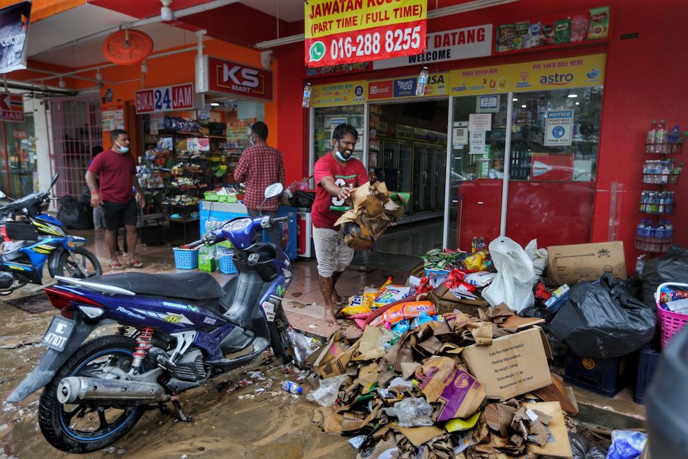 Many businesses will require a leg-up to repair and reopen their shops following the December floods. — Picture by Ahmad Zamzahuri
