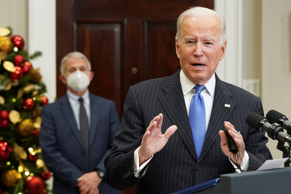 With Dr Anthony Fauci standing behind, US President Joe Biden delivers an update on the Omicron variant at the White House in Washington November 29, 2021. u00e2u20acu201d Reuters pic