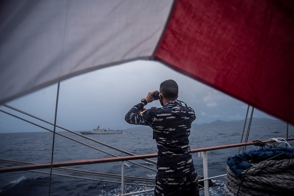 An Indonesian Naval cadets uses binoculars as he monitors the signal from the KRI Diponegoro-365 during a joint excercise on guarding Indonesia’s borders, in the North Natuna sea, Riau islands October 1, 2021. — Antara Foto/Muhammad Adimaja/ via Reuters