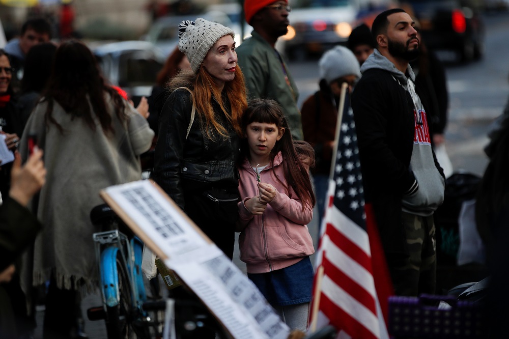 A mother and daughter join protestors as they demonstrate outside the New York City Department of Health offices December 6, 2021. u00e2u20acu201d Reuters pic
