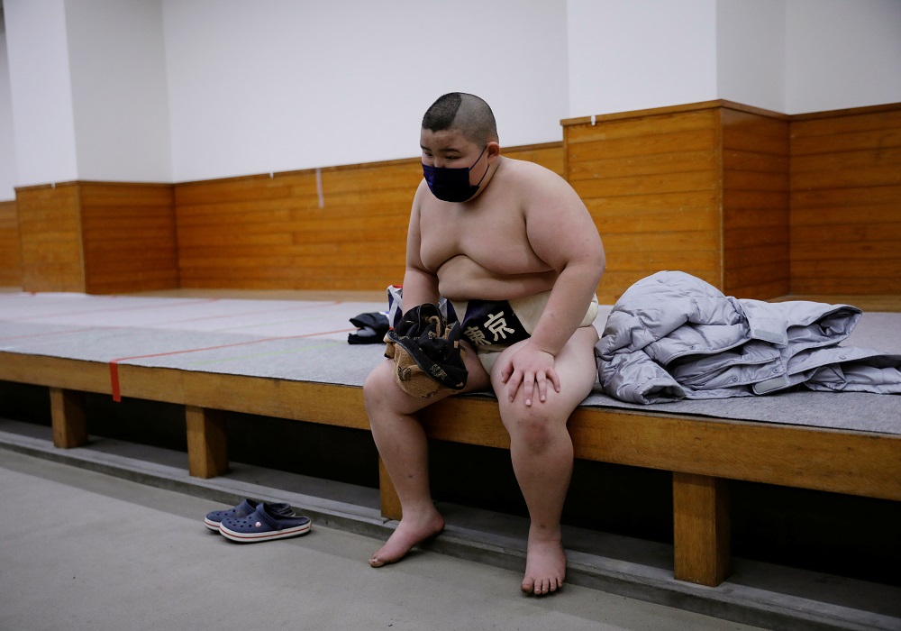 Elementary school sumo wrestler Kyuta Kumagai reacts after losing to Hisatsugu Sasaki in a tournament, at a locker room of Ryogoku Kokugikan National Sumo Stadium in Tokyo December 5, 2021. — Reuters pic