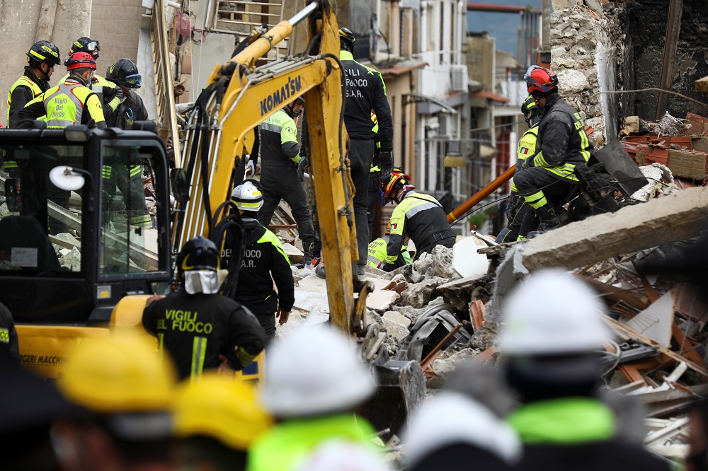 Members of a rescue team work at the scene of a gas explosion in a residential building, in Ravanusa December 12, 2021. u00e2u20acu201d Reuters pic