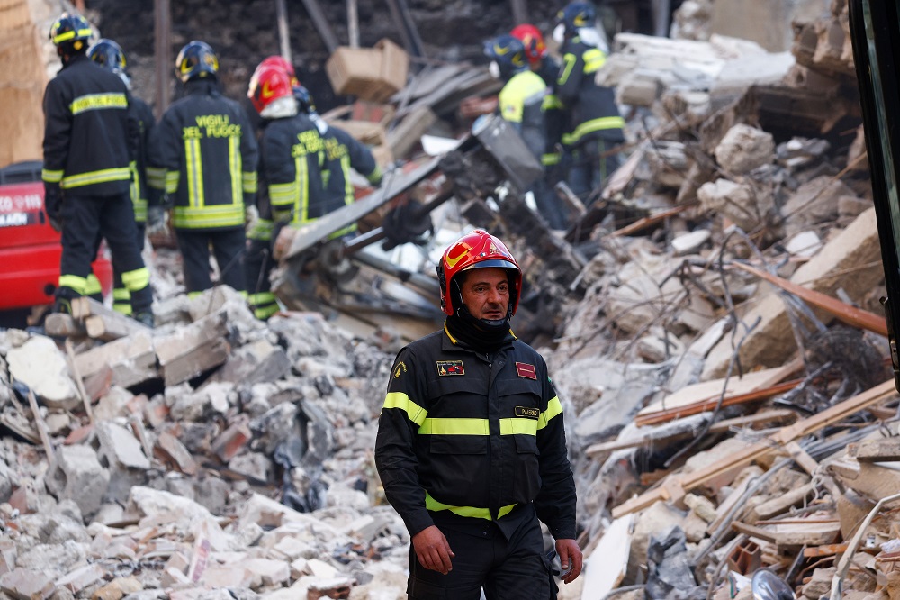 Members of a rescue team work at the scene of a gas explosion in a residential building, in Ravanusa, Italy December 12, 2021. u00e2u20acu201d Reuters pic