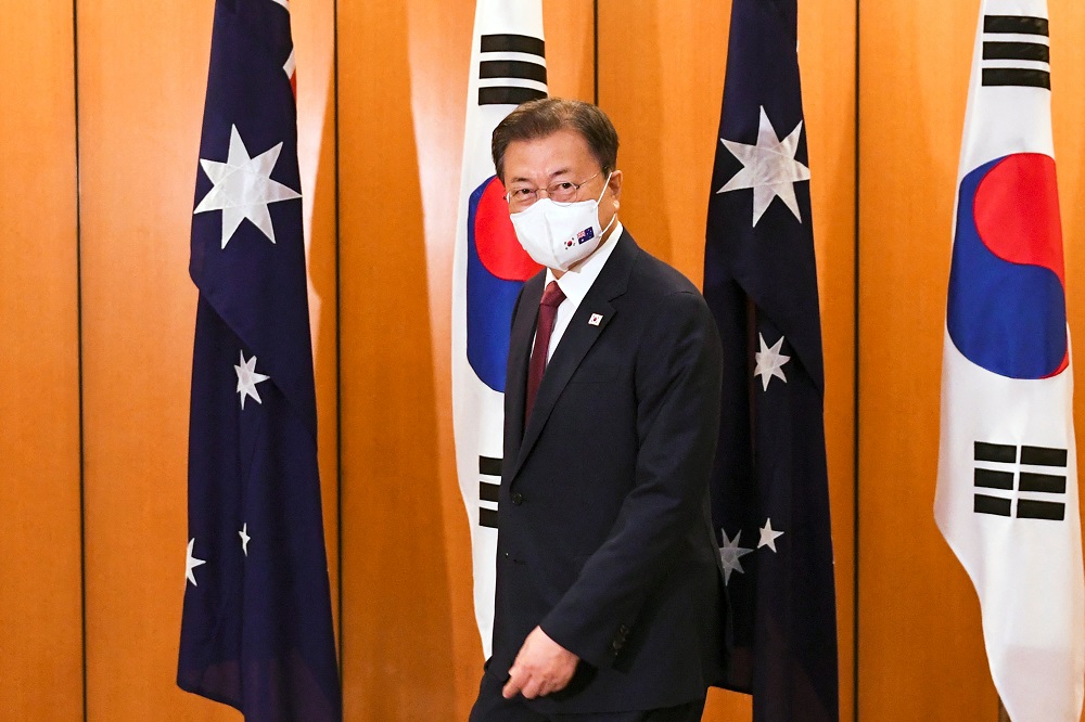 South Korean President Moon Jae-in reacts ahead of a bilateral meeting at Parliament House, Canberra December 13, 2021. u00e2u20acu201d Picture by Lukas Coch/Pool via Reuters