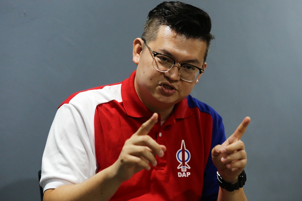 DAP candidate for the N14 Batu Kawah State Assembly Kelvin Yii Lee Wuen speaks to Malay Mail during an interview in Kuching December 8, 2021. Picture by Yusof Mat Isa