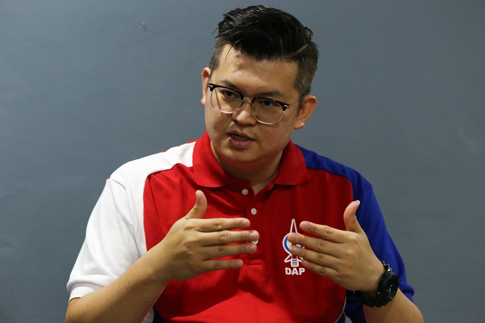 DAP candidate for the N14 Batu Kawah State Assembly Kelvin Yii Lee Wuen speaks to Malay Mail during an interview in Kuching December 8, 2021. Picture by Yusof Mat Isa