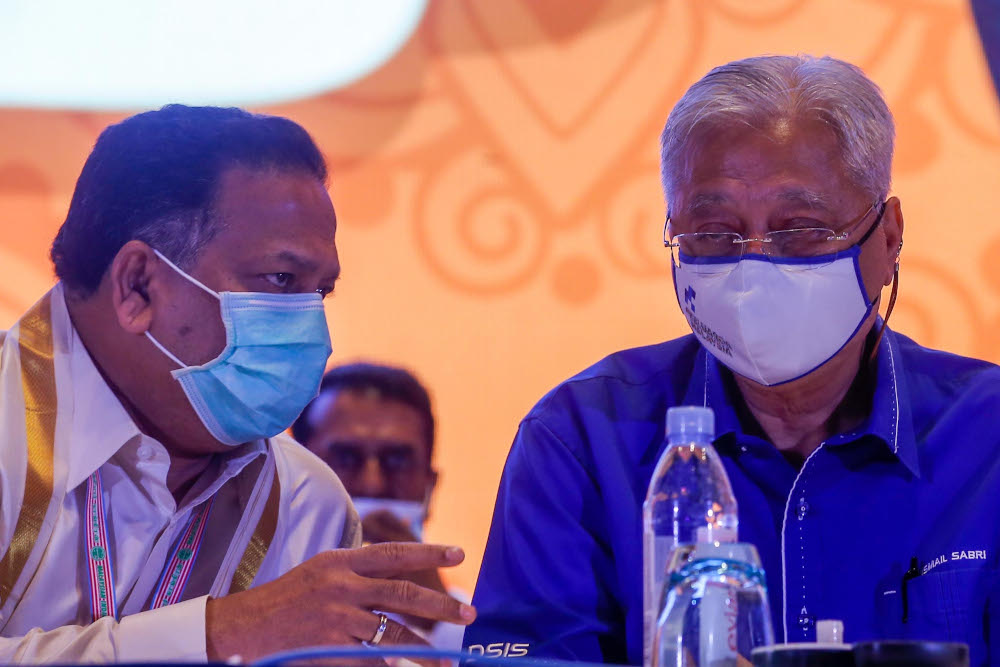 (From left) MIC president Tan Sri SA Vigneswaran and Prime Minister Datuk Seri Ismail Sabri Yaakob are seen at the 75th MIC General Assembly in Malaysia International Trade and Exhibition Centre (Mitec) December 12, 2021. u00e2u20acu201d Picture by Hari Anggara