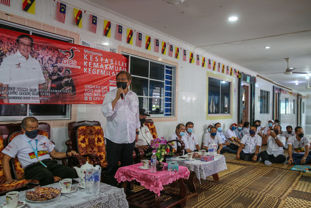 Tan Sri Abang Johari Openg speaks to residents of the Kampung Keniong Lama longhouse on his campaign trail in Simunjan December 12, 2021. — Picture by Yusof Mat Isa