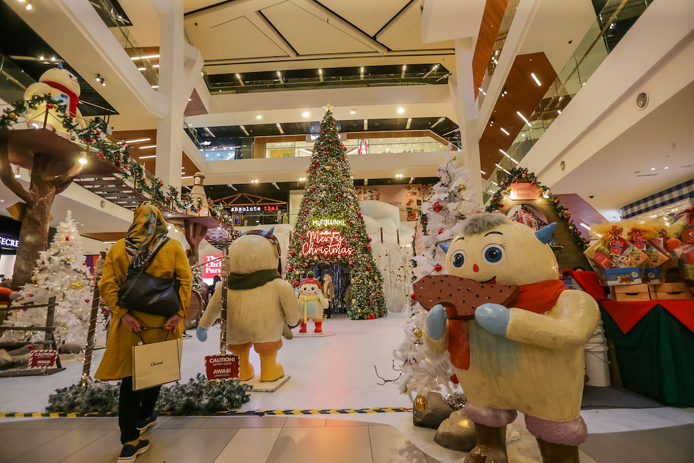 Look out for the elves who will 'welcome' you for a tour in the mall's snow village. — Picture by Devan Manuel.