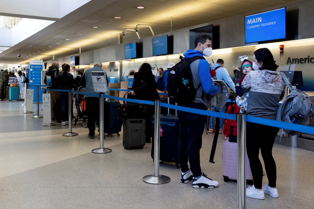 Travellers wait in line at the Philadelphia International Airport (PHL) in Philadelphia, Pennsylvania December 23 2021. u00e2u20acu201d Reuters pic