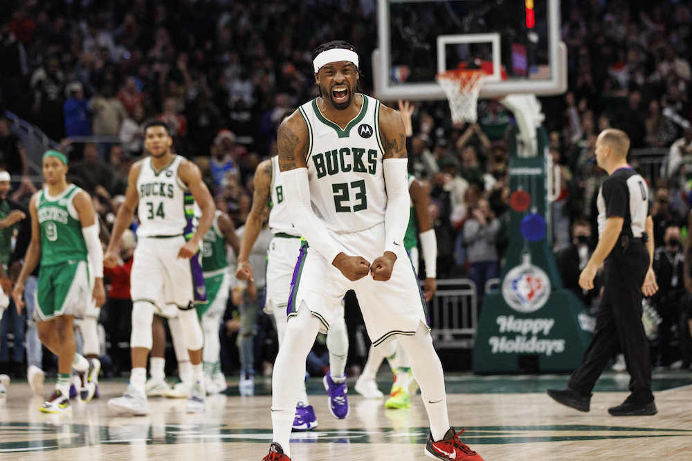 Milwaukee Bucks guard Wesley Matthews (23) celebrates after making a 3-point basket against the Boston Celtics at Fiserv Forum, Milwakee Wisconsin December 25, 2021. u00e2u20acu201d Jeff Hanisch-USA TODAY Sports via Reuters