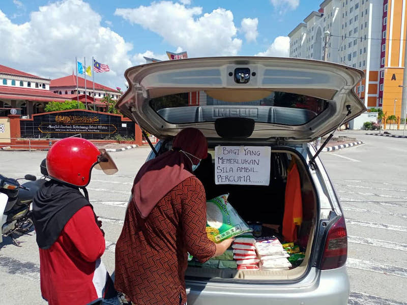 Simple acts of kindness go a long way, like this car food bank that a Penangite setup to help others during the pandemic. u00e2u20acu201d Picture courtesy of Azizul Rahim