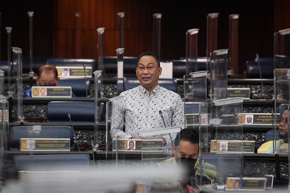 Deputy Human Resources Minister Datuk Awang Hashim addresses members of Parliament in Dewan Rakyat December 2, 2021. u00e2u20acu201d Bernama picnn